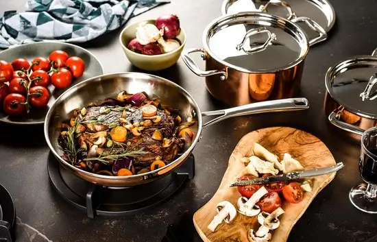 DUCQ Koekenpan Koper 26 cm met hol handvat en RVS deksel, geschikt voor alle warmtebronnen inclusief inductie